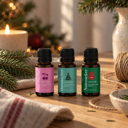 Three holiday fragrance oil bottles, still life